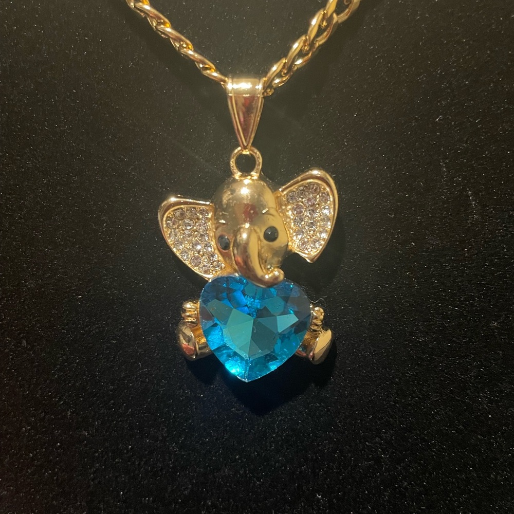 Gold Elephant Pendant Necklace with Blue Heart